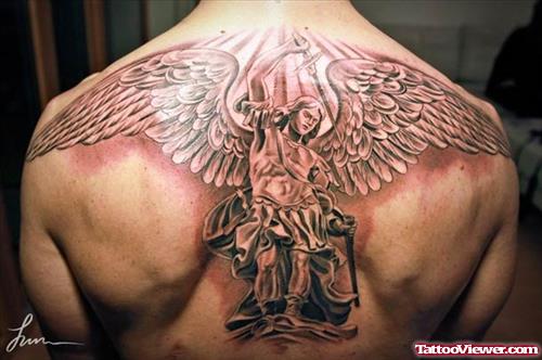 Grey Ink Greek Angel Tattoo On Upperback