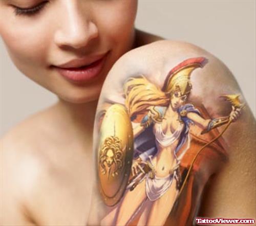 Beautiful Colored Greek Tattoo On Girl Left Shoulder