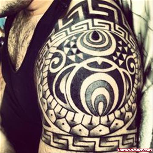 Man Left Shoulder Greek Tattoo