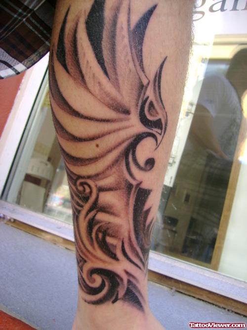 Grey Ink Tribal Greek Tattoo On Arm