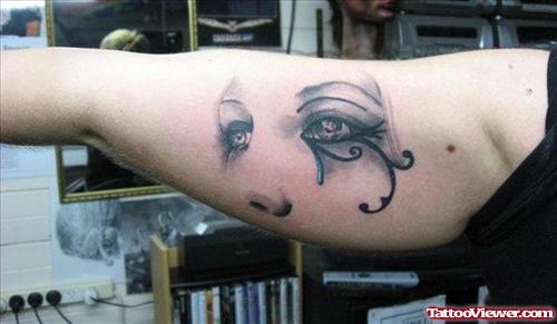 Grey Ink Greek Tattoo On Right Bicep