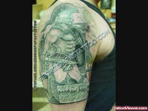 Awful Greek Tattoo On Man Right Half Sleeve