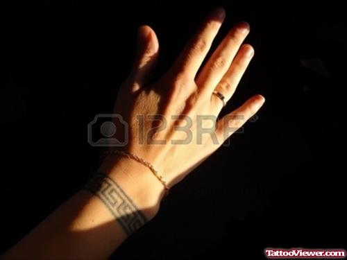 Greek Tattoo On Girl Right Wrist