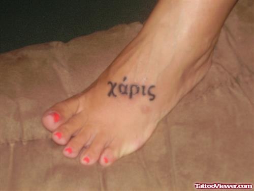 Greek Tattoo On Girl Left Foot