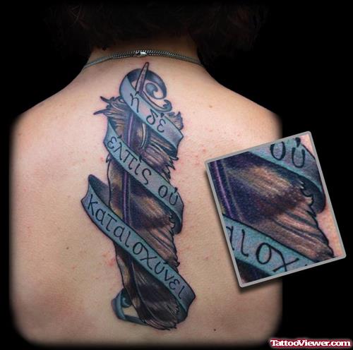 Feather With Banner Greek Tattoo On Back