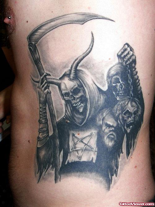 Grey Ink Grim Reaper Tattoo On Man Side Rib