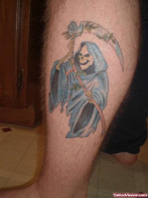 Blue Ink Grim Reaper Tattoo On Leg