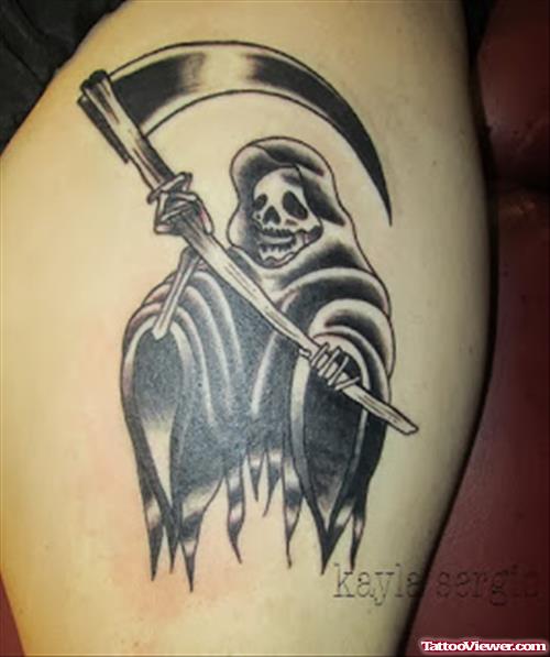 Black Ink Grim Reaper Tattoo On Leg