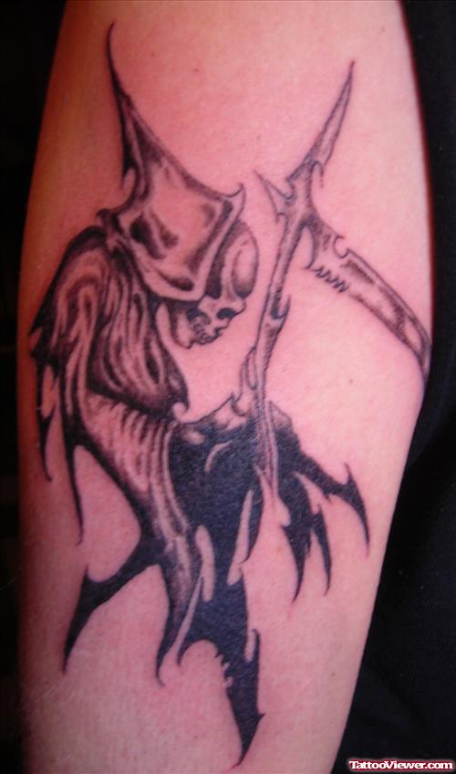 Beautiful Grim Reaper Tattoo On Biceps