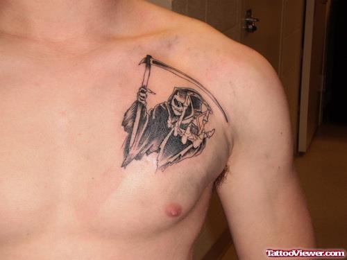 Beautiful Black Ink Grim Reaper Tattoo On Man Chest