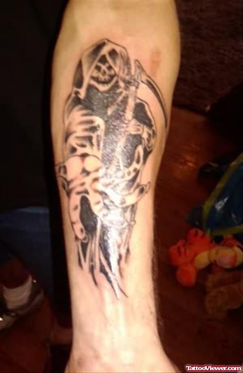 Amazing Black Ink Grim Reaper Tattoo On Left Arm
