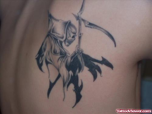 Tribal Black Ink Grim Reaper Tattoo On Back