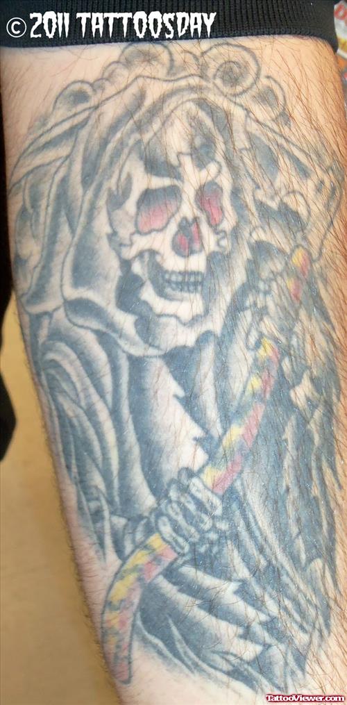 Grey Ink Grim Reaper Tattoo On Leg