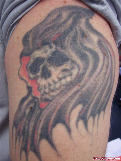 Grey Ink Grim Reaper Skull Tattoo On Shoulder