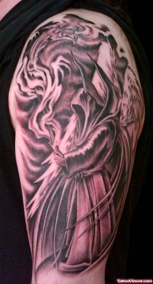 Grey Ink Grim Reaper Tattoo On Man Left Sleeve