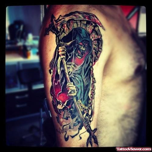 Colored Grim Reaper Tattoo On Man Right Sleeve