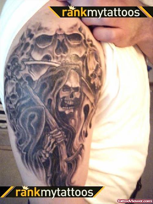 Attractive Grey Ink Grim Reaper Tattoo On Man Right Sleeve