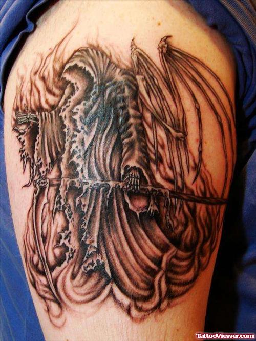 Grey Ink Grim Reaper Tattoo On Shoulder