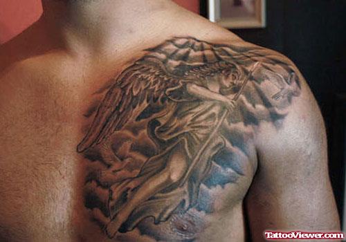 Flying Grim Reaper Tattoo On Man Chest