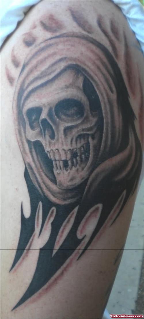 Tribal Grim Reaper Tattoo On Left Half Sleeve