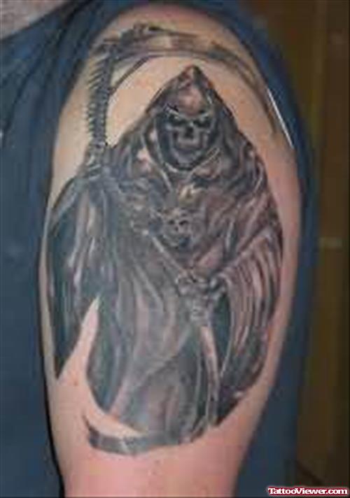 Grey Ink Grim Reaper Tattoo On Man Left Half Sleeve