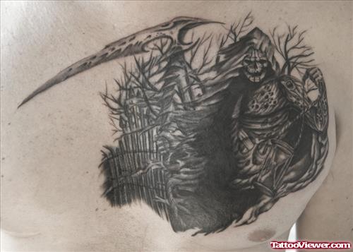 Black Ink Grim Reaper Tattoo On Man Chest
