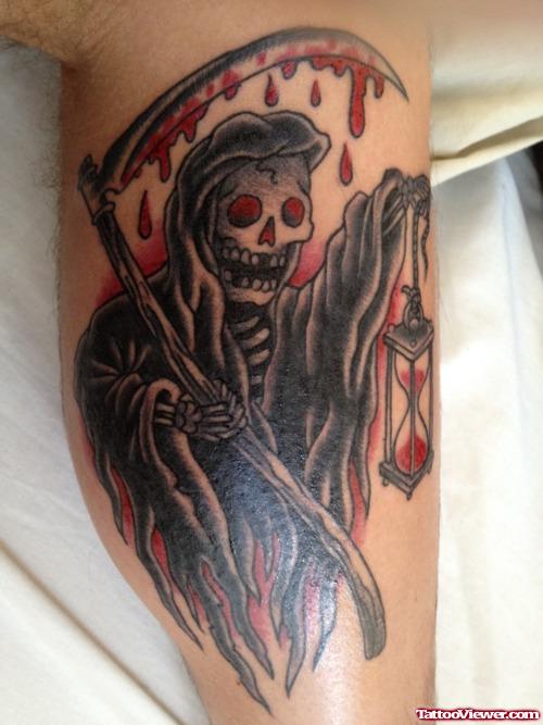 Bleeding Grim Reaper Tattoo On Leg
