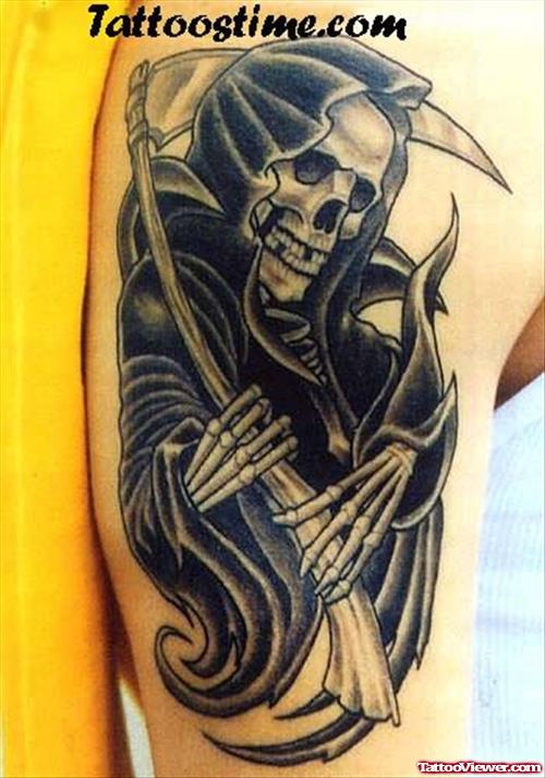 Dark Black  Grim Reaper Tattoo On Bicep