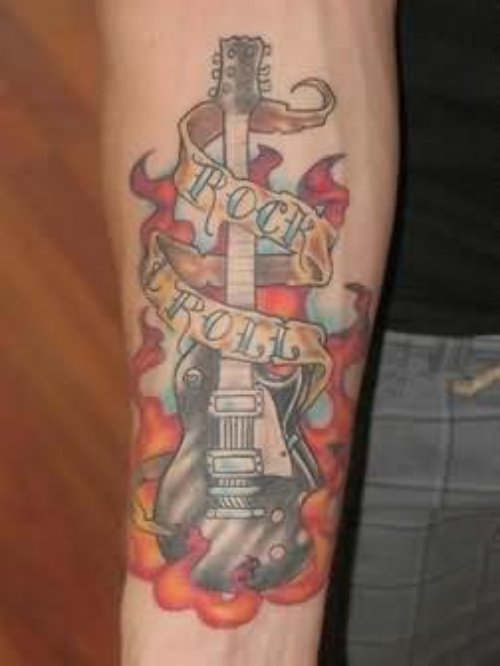 Flaming Guitar With Banner Tattoo On Sleeve