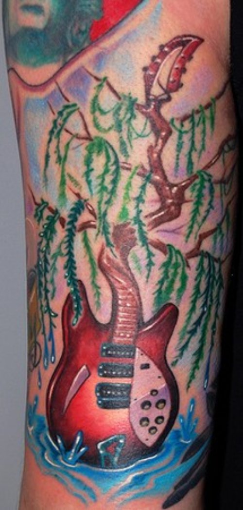 Red Guitar Tree Tattoo on Sleeve