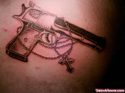 Rosary and Gun Tattoo
