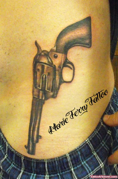 Revolver Gun Tattoo On Side Rib