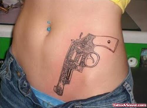 Gun Tattoo On Girl Left Hip