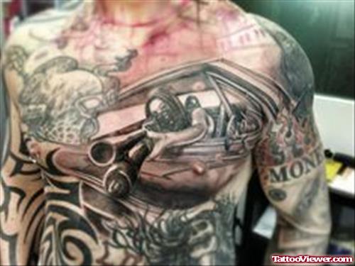 Dark Ink Guns Tattoos On Man Chest