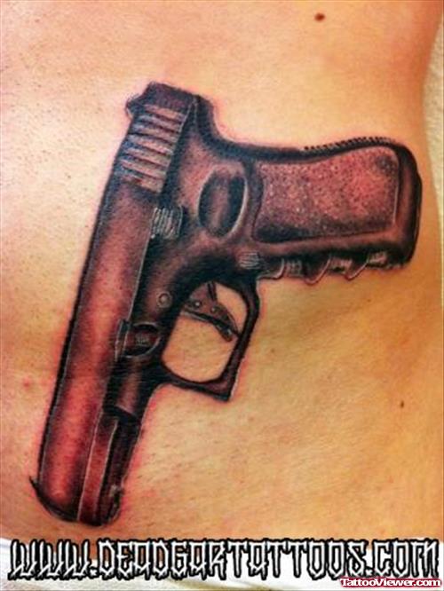 Amazing Dark Ink Gun Tattoo