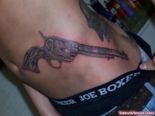 Gun Tattoo On Left Side