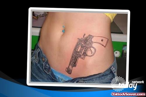 Gun Tattoo On Left Hip