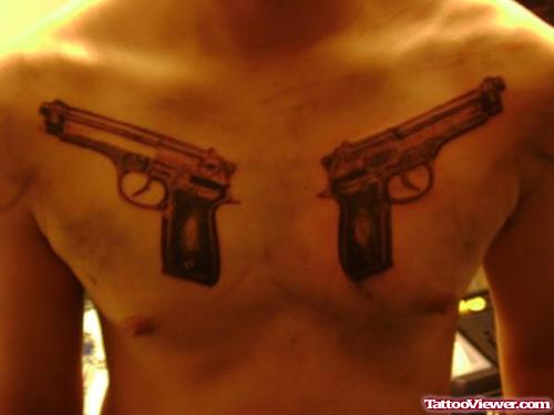 Grey Ink gun Tattoos On Man Chest