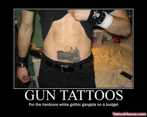 Attractive Gun Tattoo On Stomach
