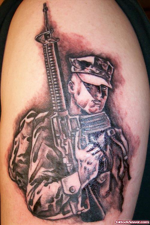 Grey Ink Military With Gun Tattoo On Half Sleeve