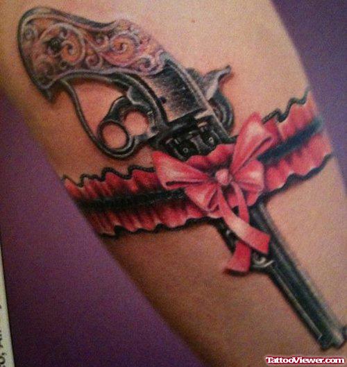 Ribbons and Gun Tattoo