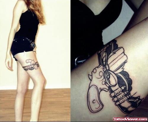 Girl With Gun Tattoo On Right Thigh