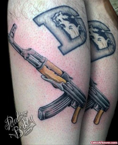 Alphabet d And Gun Tattoo