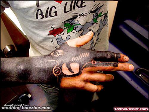 Hand Gun Tattoo On Right Hand
