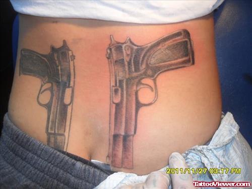 Gun Tattoos On Back Waist