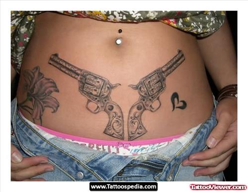Flower And Guns Tattoos On Belly