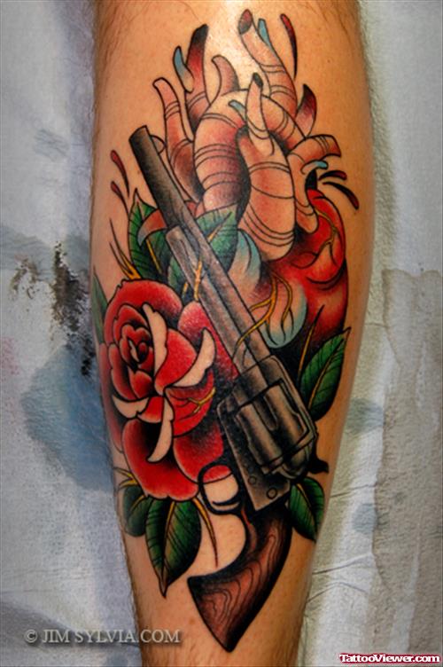 Red Rose Flowers And Gun Tattoo On Arm