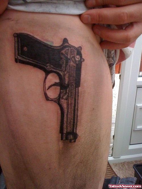 Gun Tattoo On Man Right Thigh
