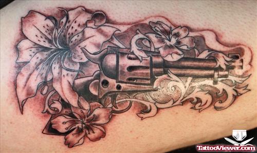 Floral Flowers And Gun Tattoo