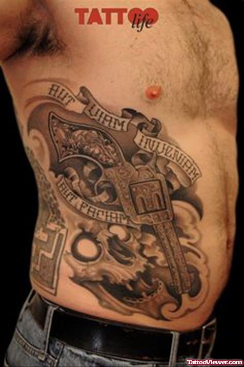 Banner And Gun Tattoos On Man Side Rib